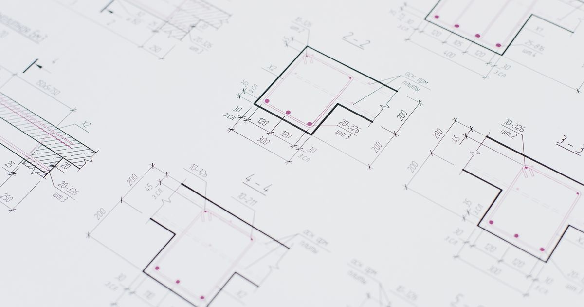 Overlapping architectural blueprint drawings